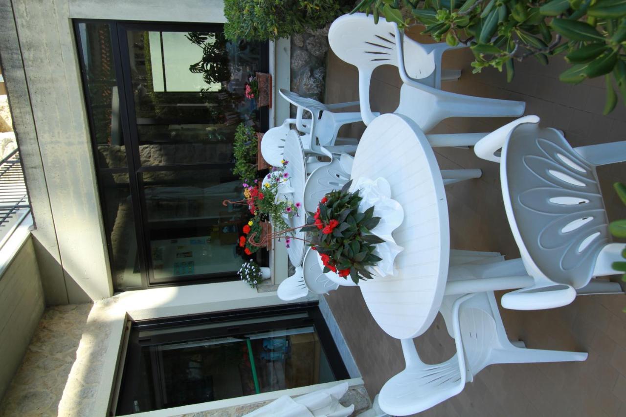 Hotel Montecarlo ลิโด ดิ กามาโยเร ภายนอก รูปภาพ